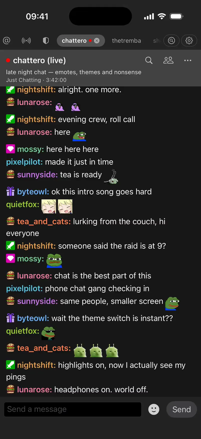 Chattero on iPhone in the Dark theme: the chattero demo channel live, with a sample English conversation, badges, and community emotes rendered by the real app.