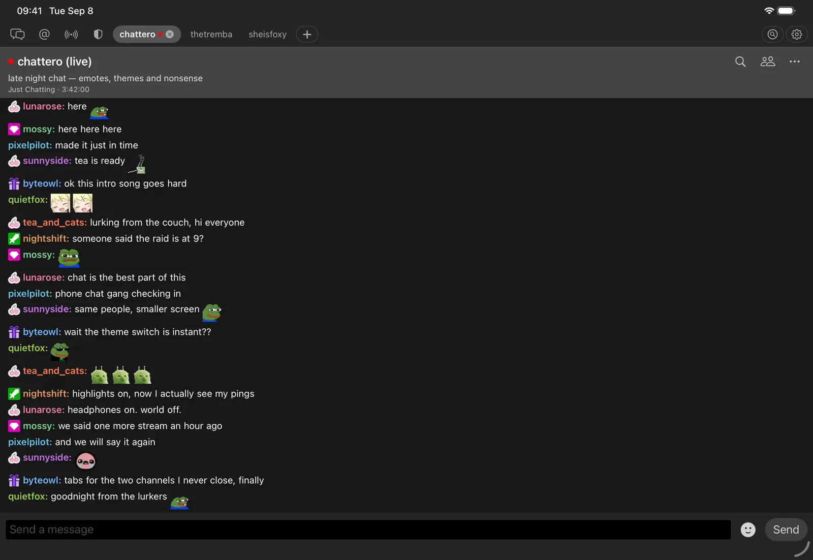 Chattero on iPad Pro in landscape, Dark theme: the chattero demo channel live with a sample English conversation, badges and community emotes.